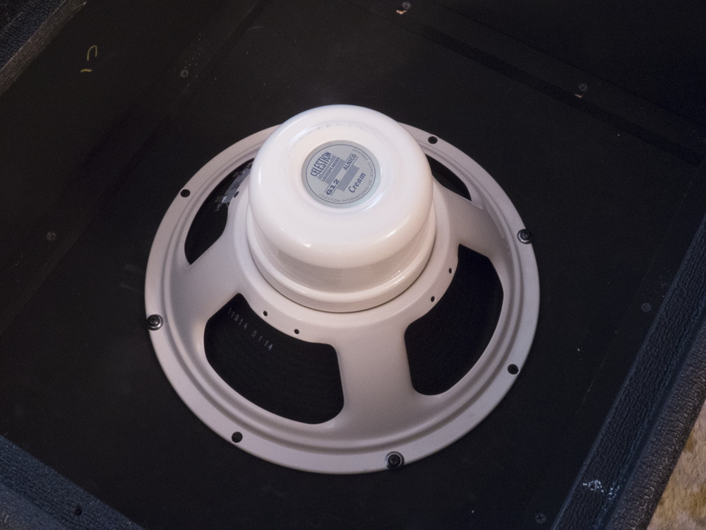 Image shows Celestion Cream speaker mounted in a cabinet.